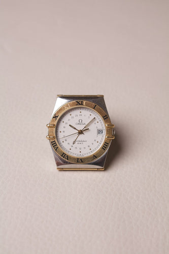 Montre Omega Constellation - Montre GMT en acier et or jaune 18K 58 Facettes MONTRE-026