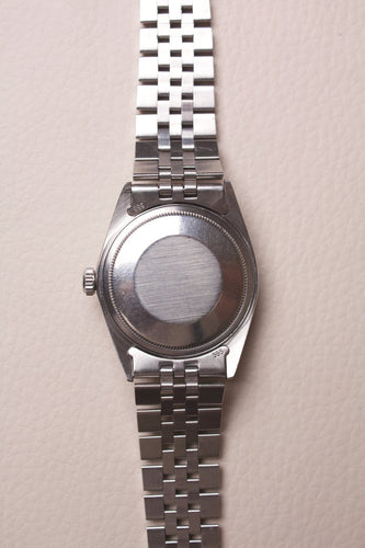 Montre Rolex Datejust - Montre 1603 en acier cadran lavande 58 Facettes MONTRE-029