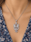Collier Collier pendentif en platine et or blanc avec diamants 58 Facettes 31840
