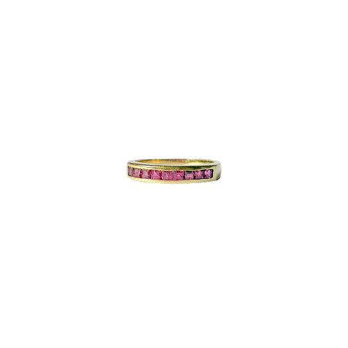 Bague demi-alliance en or jaune et rubis