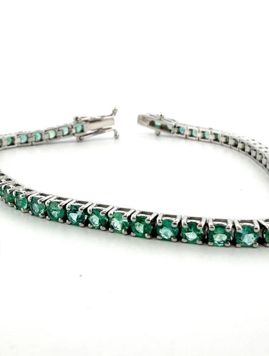 Bracelet Bracelet tennis en or blanc et émeraudes 58 Facettes 559/26 A