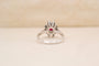 https://cdn.shopify.com/s/files/1/0963/7950/2920/files/bague-ancienne-marguerite-vintage-rubis.jpg?v=1789721952