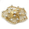 Broche Broche fleur en or jaune et diamants 58 Facettes 250005SP