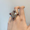 Bague 53 Bague en or blanc, diamants, rubis et perle 58 Facettes 230049SP