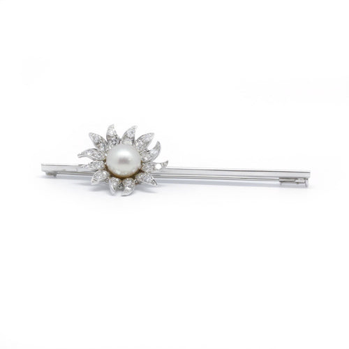 Broche Broche fleur en or blanc, platine, perle et diamants 58 Facettes 200068R