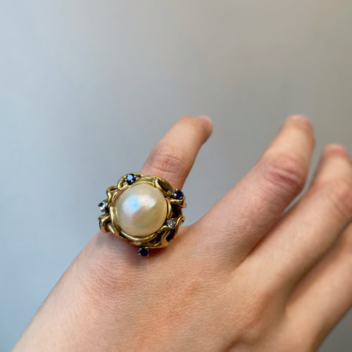 Bague 49 Bague en or jaune, perle, diamants et saphirs 58 Facettes 230022SP