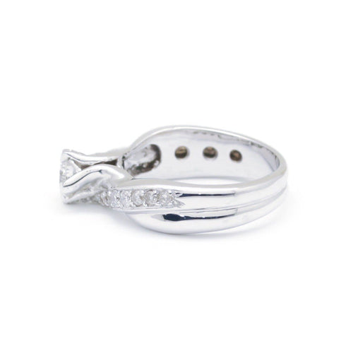 Bague 53 Bague torsadée en or blanc et diamants 0,35 ct 58 Facettes 220562R
