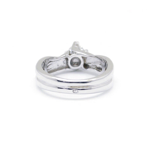 Bague 53 Bague torsadée en or blanc et diamants 0,35 ct 58 Facettes 220562R