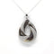 Collier Collier pendentif en or blanc, diamants et nacre noire 58 Facettes 170040R