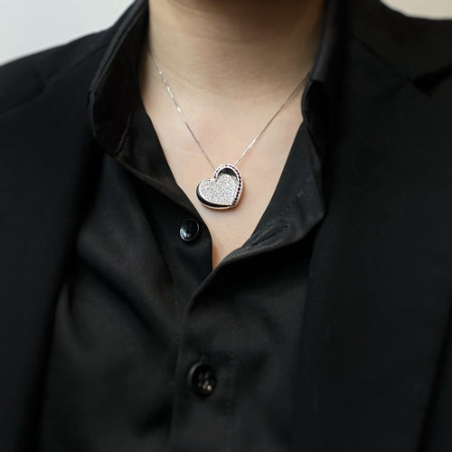 Collier Collier cœur en or blanc, diamants et rubis 58 Facettes 220549R