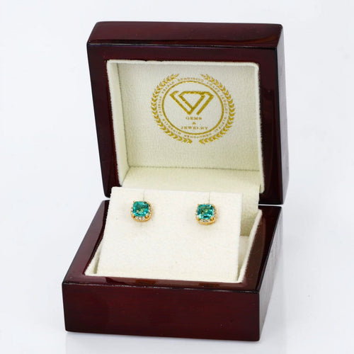 Boucles d'oreilles Boucles d'oreilles en or jaune 14 ct, émeraudes et diamants 58 Facettes E0057
