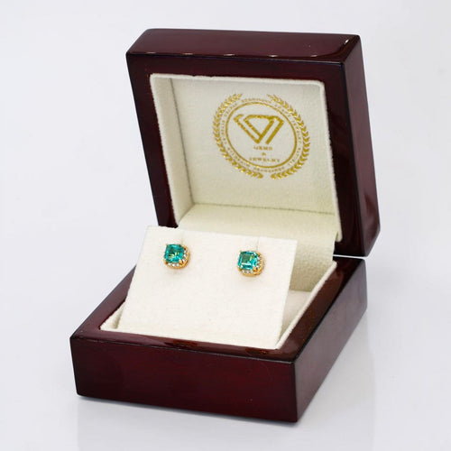 Boucles d'oreilles Boucles d'oreilles en or jaune 14 ct, émeraudes et diamants 58 Facettes E0057