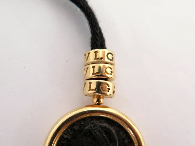 Collier Bulgari Monete - Collier pendentif en or jaune 18k avec pièce ancienne 58 Facettes 275128