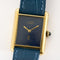 Montre Cartier Tank Must - Montre en argent plaqué or cadran bleu 58 Facettes A1249