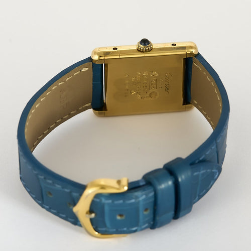 Montre Cartier Tank Must - Montre en argent plaqué or cadran bleu 58 Facettes A1249