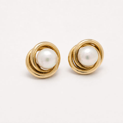 Boucles d'oreilles Boucles d'oreilles en or jaune 18 carats et perles 58 Facettes 38005