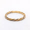Bague 54 Cartier - Bague torsadée en trois ors 58 Facettes 37902