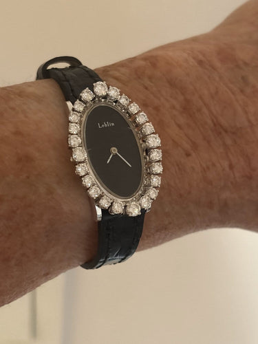 Montre LEBLIN - Montre dame en or gris et diamants 58 Facettes LOT 8110