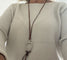 Pendentif Hermès - Pendentif en argent avec lanière en cuir 58 Facettes LOT 8077