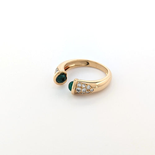 https://18carats.fr/wp-content/uploads/2026/09/38053-38488-Bague-jonc-en-or-jaune-emeraudes-et-diamants-scaled.jpg