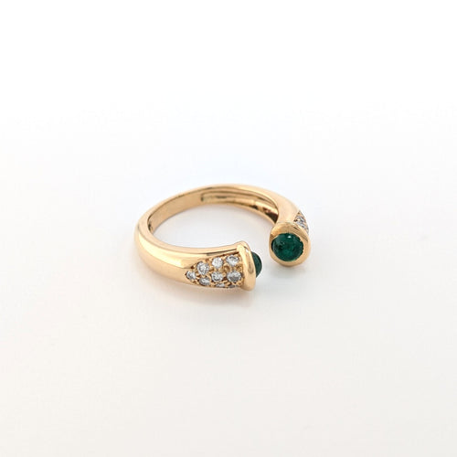 https://18carats.fr/wp-content/uploads/2026/09/38053-38490-Bague-jonc-en-or-jaune-emeraudes-et-diamants-scaled.jpg