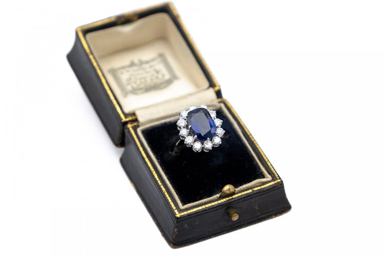 exclusive-white-gold-ring-with-a-sapphire-and-120-ct-diamonds (1).jpg