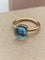 Bague 53 Pomellato Nudo Petit - Bague en or jaune 750 et topaze bleue 58 Facettes CV-131