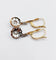 Boucles d'oreilles Dormeuses marguerite anciennes en or 18k, platine et diamants taille rose 58 Facettes A07848
