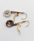 Boucles d'oreilles Dormeuses marguerite anciennes en or 18k, platine et diamants taille rose 58 Facettes A07848