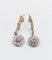 Boucles d'oreilles Dormeuses marguerite anciennes en or 18k, platine et diamants taille rose 58 Facettes A07848