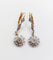 Boucles d'oreilles Dormeuses marguerite anciennes en or 18k, platine et diamants taille rose 58 Facettes A07848