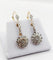 Boucles d'oreilles Dormeuses marguerite anciennes en or 18k, platine et diamants taille rose 58 Facettes A07848