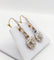 Boucles d'oreilles Dormeuses marguerite anciennes en or 18k, platine et diamants taille rose 58 Facettes A07848