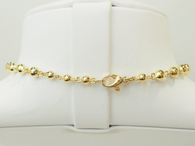 https://cdn.shopify.com/s/files/1/0750/3799/9372/files/l-aurore-collier-marseillais-or-jaune-fermoir.jpg?v=1790170755