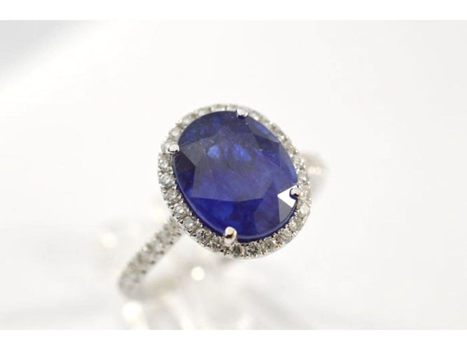 Bague 53 Bague halo en or blanc, diamants et saphir 58 Facettes 1026