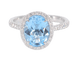 Bague halo en or blanc, topaze ovale et diamants