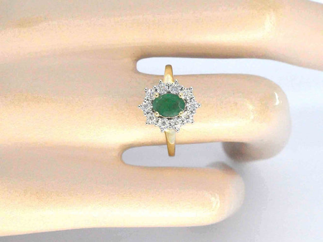 Bague 54 Bague en or 14 ct, émeraude ovale et diamants 58 Facettes 2368