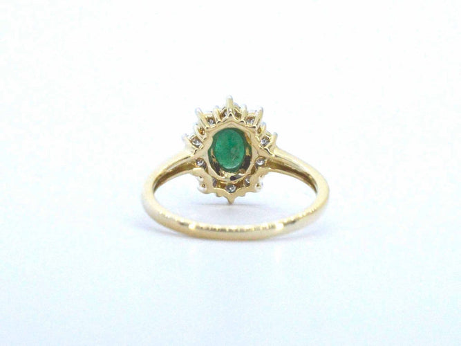 Bague 54 Bague en or 14 ct, émeraude ovale et diamants 58 Facettes 2368