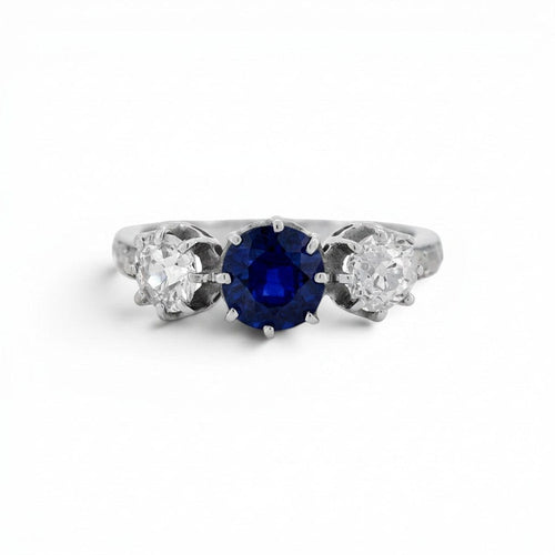 https://cdn.shopify.com/s/files/1/1015/8633/8124/files/antique-art-deco-18k-white-gold-sapphire-diamond-trilogy-ring-front.jpg?v=1784916643