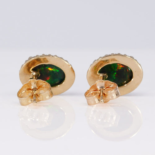 Boucles d'oreilles Boucles d'oreilles en or jaune 14 ct, opales noires et diamants 58 Facettes E0062