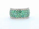 Bague 54 Bague pavée en or blanc, diamants naturels et émeraudes 58 Facettes 2382