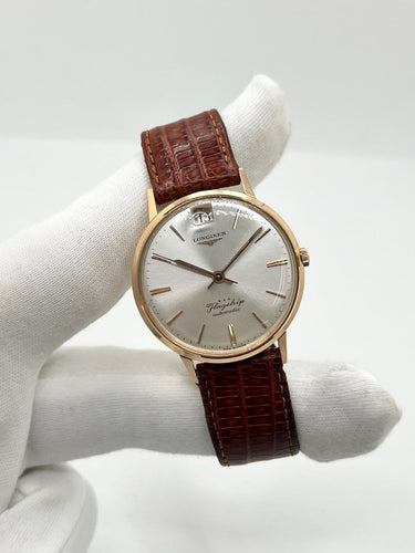 Montre Longines Flagship - Montre automatique en or rose 18 carats 58 Facettes 2149