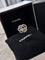 Bague 52 Chanel Fil de Camélia - Bague en or blanc 750 diamants 58 Facettes jnci195