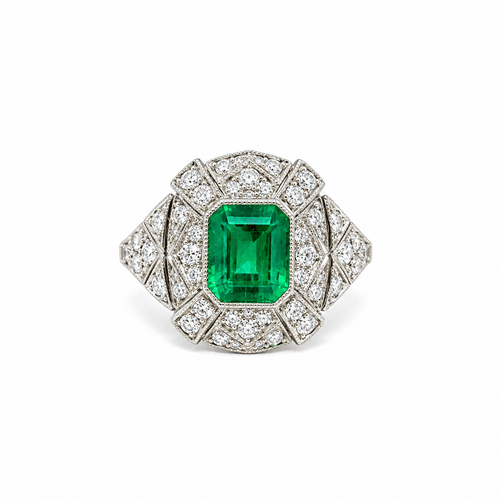 Bague 57 Bague en platine, émeraude et halo de diamants 58 Facettes 50531