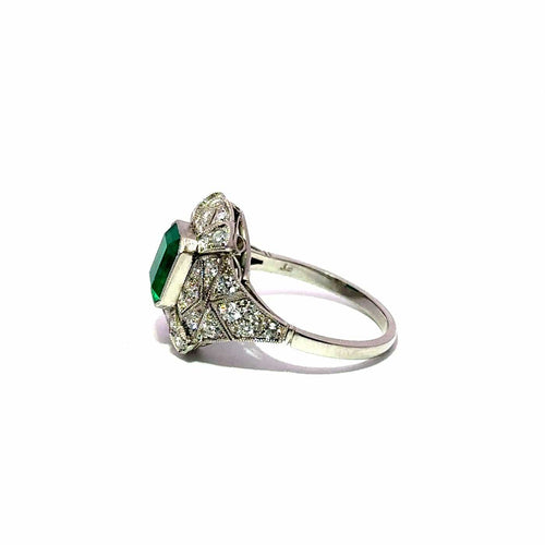Bague 57 Bague en platine, émeraude et halo de diamants 58 Facettes 50531