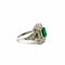 Bague 57 Bague en platine, émeraude et halo de diamants 58 Facettes 50531