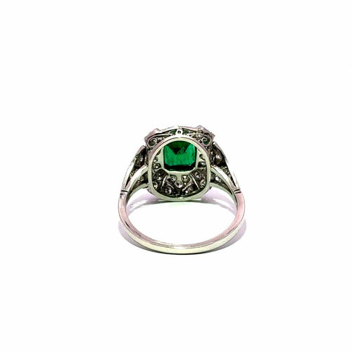 Bague 57 Bague en platine, émeraude et halo de diamants 58 Facettes 50531