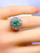 Bague 45 Bague marguerite en or 18 carats, émeraude et diamants 58 Facettes AB742