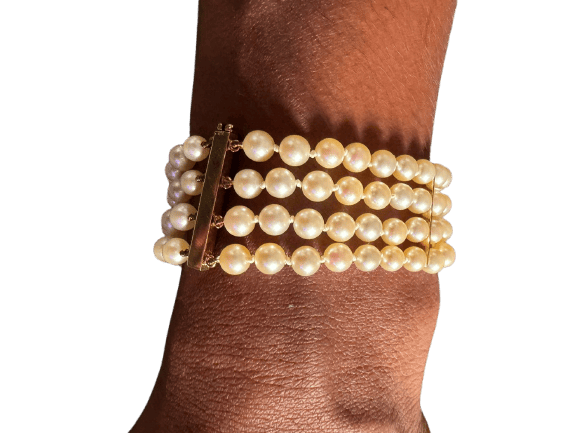 Bracelet Bracelet 4 rangs de perles de culture en or 18k 58 Facettes 964