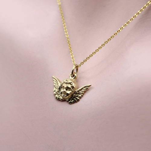 Pendentif Pendentif charm chérubin ailé en or 14K 58 Facettes